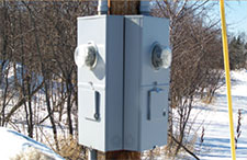 Meter enclosures on power pole